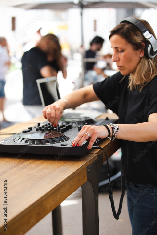 Young female disc jockey Young female disc jockey