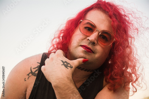 Trans woman with pink hair portrait photo