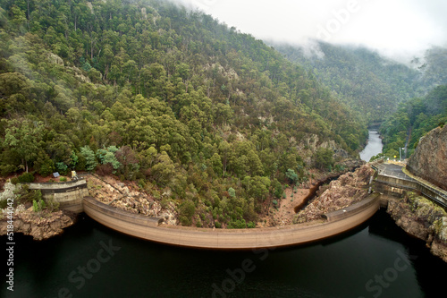 Renewable hydro electric energy power dam in green rainforest