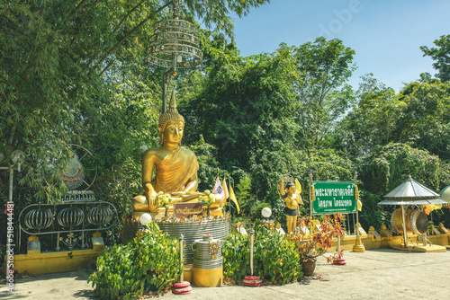 Atmosphere inside religious tourist attractions at Maha Chedi Tripob Trimongkol with large stainless steel pagoda. Photo from Phra Maha That Chedi Triphop Tri Mongkhon, Hat Yai, Thailand  photo