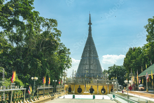 Atmosphere inside religious tourist attractions at Maha Chedi Tripob Trimongkol with large stainless steel pagoda. Photo from Phra Maha That Chedi Triphop Tri Mongkhon, Hat Yai, Thailand  photo