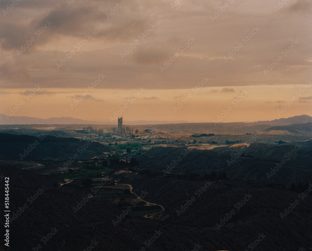 Industrial Plant In Vast Mountain Landscape Industrial Plant In Vast Mountain Landscape