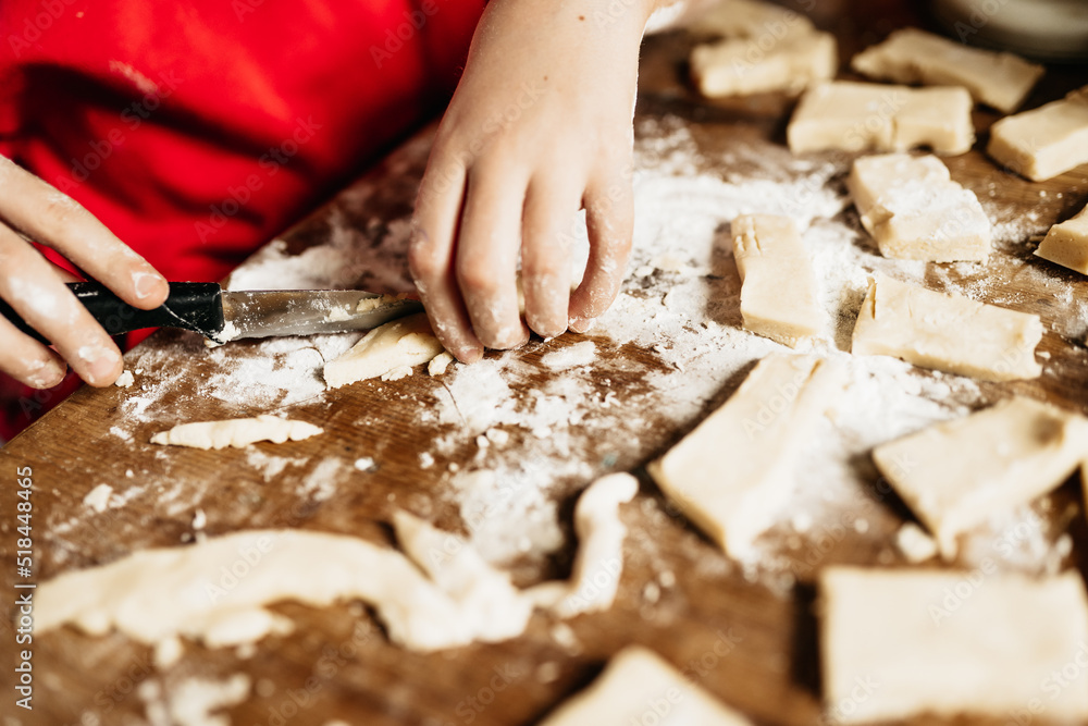 hands making shortbread cookies for Christmas hands making shortbread cookies for Christmas