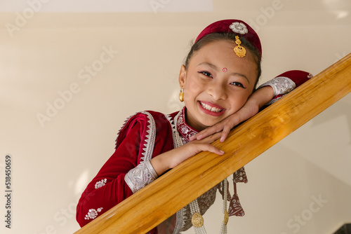 Nepali girl in traditional attire smiling photo