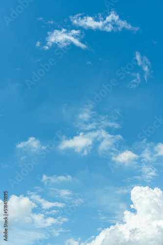 White clouds float in the sky in summer. Sunny day, sea of clouds, sky and weather material.