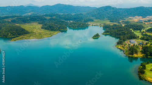 Aerial drone view of lake scenery with turquoise water in Tasik Puteri  Bukit Besi  Terengganu  Malaysia.