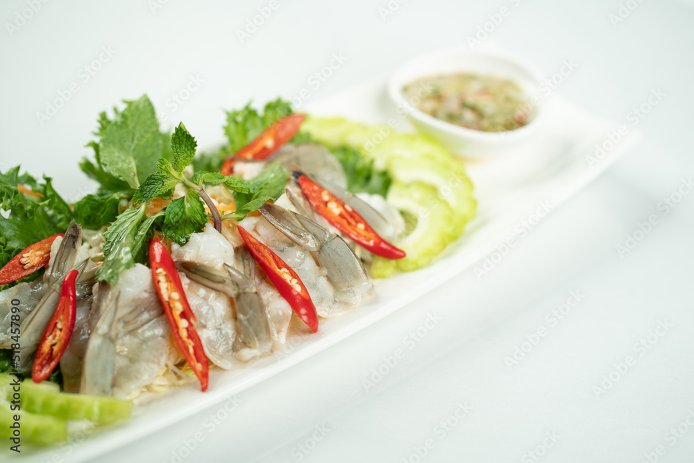 Thai spicy salad with shrimp white background
Thai spicy salad with shrimp white background