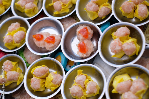 Chinese food "dim sum" on self service busket tray background. Tradition Dimsum is local food in Songkhla, South of Thailand. 