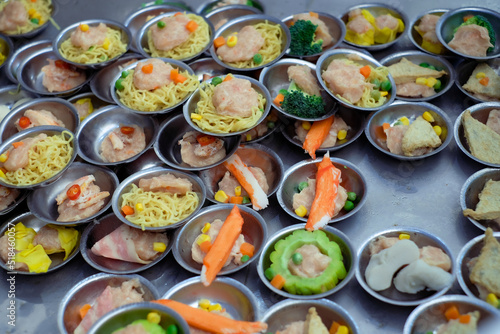 Chinese food "dim sum" on self service busket tray background. Tradition Dimsum is local food in Songkhla, South of Thailand. 