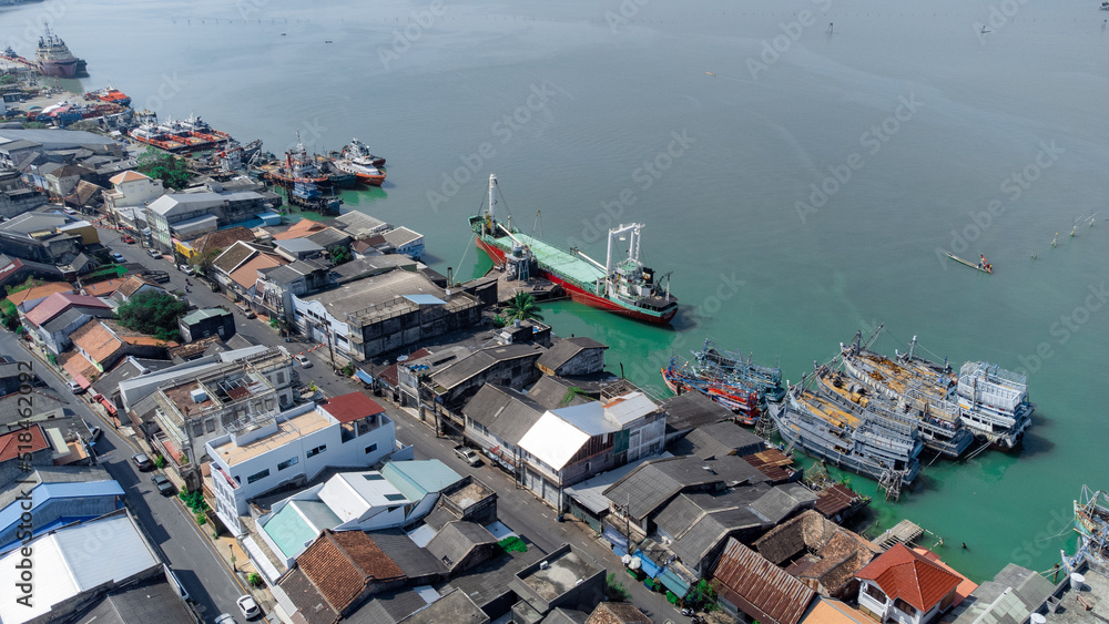 Aerial view of fisherman dock which has many ships anchoring for transport seafood and supplies on island of Songkhla, Thailand