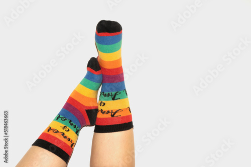 A anonymous person wearing rainbow socks - LGBT pride symbol photo