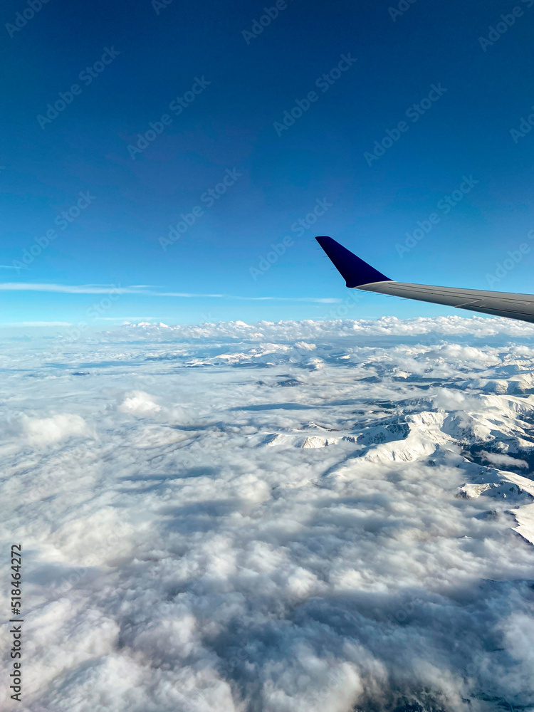 Aeroplane wings over the mountains Aeroplane wings over the mountains