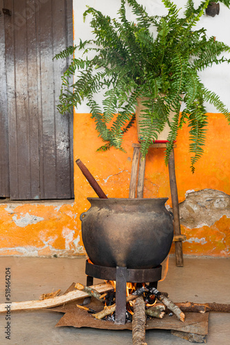 clay pot on the fire in a house  photo