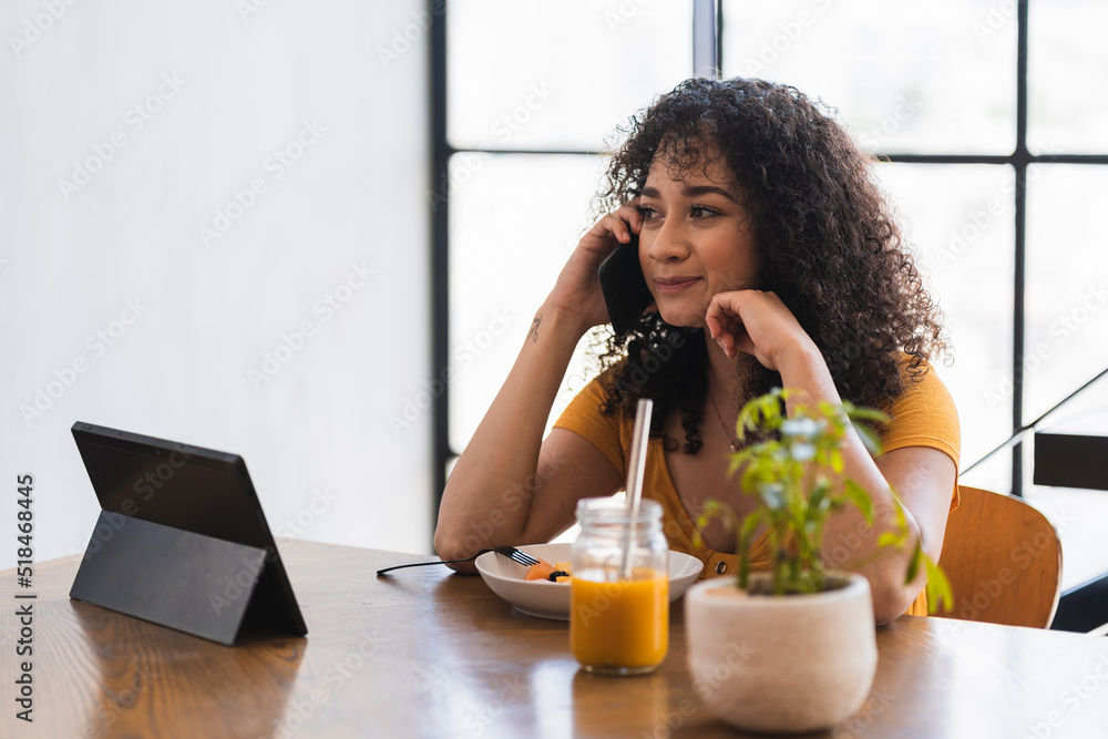 Woman Making A Call During Breakfast Woman Making A Call During Breakfast