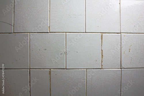 Wallpaper Mural Old cracked tiled dirty tile texture.Dilapidated old dirty tile wall background. Torontodigital.ca