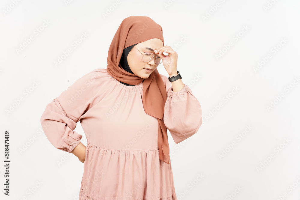Suffering Headache gesture of Beautiful Asian Woman Wearing Hijab Isolated On White Background Suffering Headache gesture of Beautiful Asian Woman Wearing Hijab Isolated On White Background