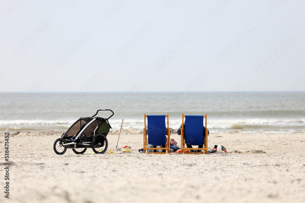 Family resting at the beach