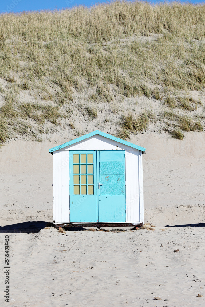 Painted little hut on a beach in Holland Painted little hut on a beach in Holland