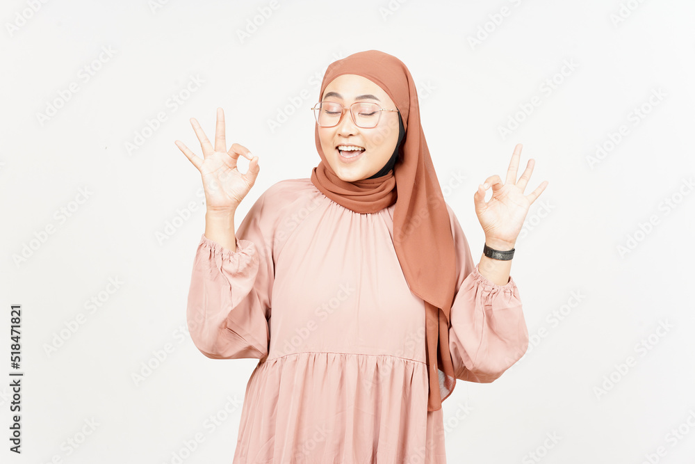 Showing OK Sign of Beautiful Asian Woman Wearing Hijab Isolated On White Background