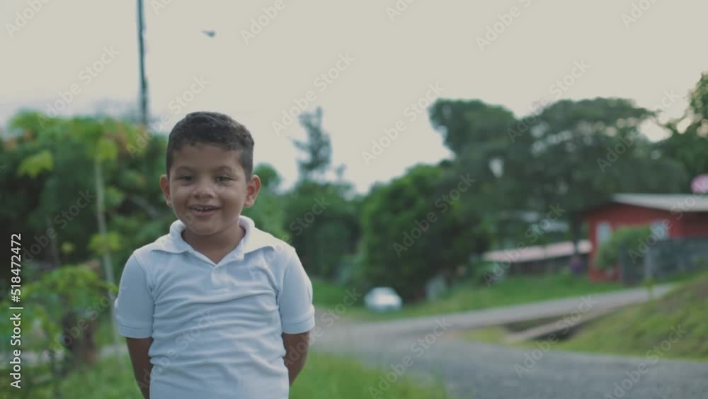 boy in white sweater pointing to the sky, medium shot boy in white sweater pointing to the sky, medium shot