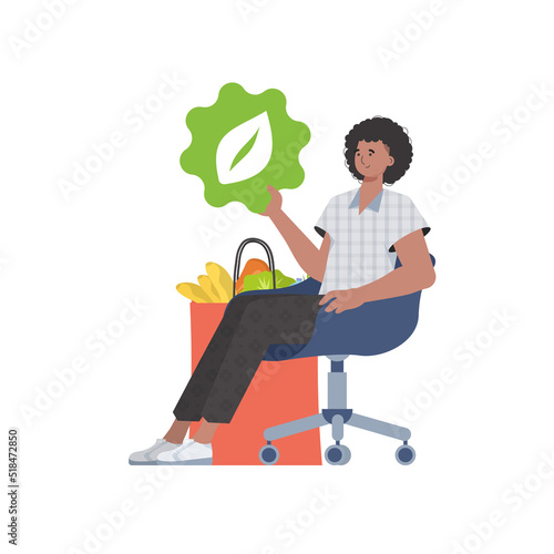 A man is sitting next to a bag of healthy food and is holding an EKO icon. Isolated on white background. Flat trendy style. Vector.