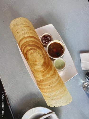 Masala dosa on restaurant table photo