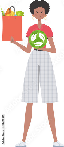 The girl is depicted in full growth and holds a bag of healthy food in her hands and shows the EKO icon. Isolated. Flat trendy style. Vector.