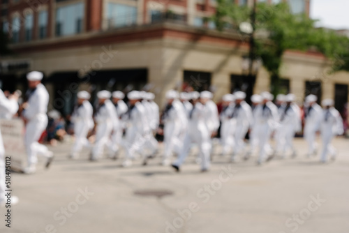 Blurry US Navy troop on parade photo