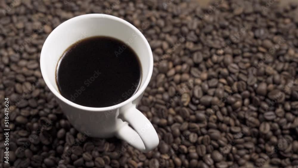 Dark roast coffee beans background, top view Dark roast coffee beans background, top view