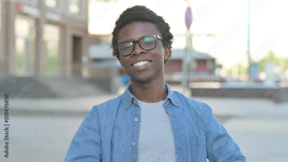 Loving Young African Man showing Heart Shape by Hands Outdoor Loving Young African Man showing Heart Shape by Hands Outdoor