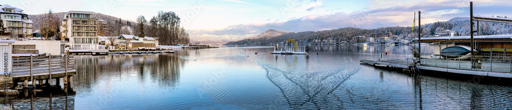 Fototapeta premium Velden, Lake Wörthersee, Austria. Panorama of Wörthersee in Velden with floating Christmas crib on the lake