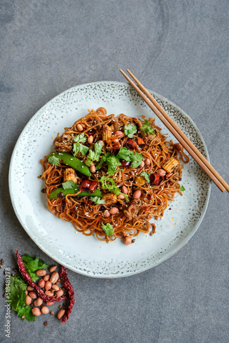 Delicious and spicy homemade meal. Stir Fry Sichuan Mala Noodle with Ground Pork or Pork Slices. Assortments of chili pepper to give the exclusive flavors and tongue numbing  sensation photo