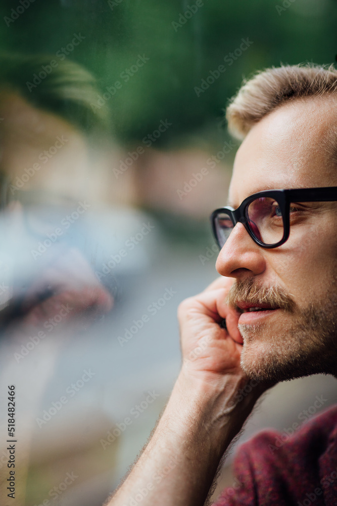 Man Looking through Window Man Looking through Window