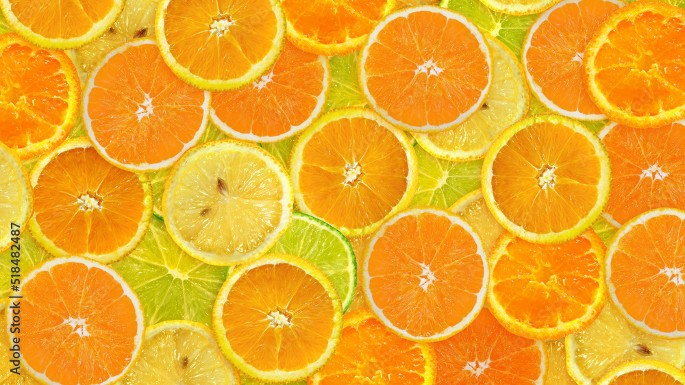 Fresh sliced mixed citrus fruits background. Concept of healthy eating, dieting. Top view Fresh sliced mixed citrus fruits background. Concept of healthy eating, dieting. Top view