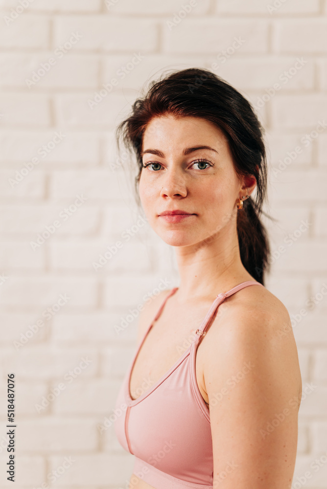 Fit woman in sportswear doing workout yoga burning fat calories training strength practicing effort domestic fitness females aerobics sport fit at home Fit woman in sportswear doing workout yoga burning fat calories training strength practicing effort domestic fitness females aerobics sport fit at home