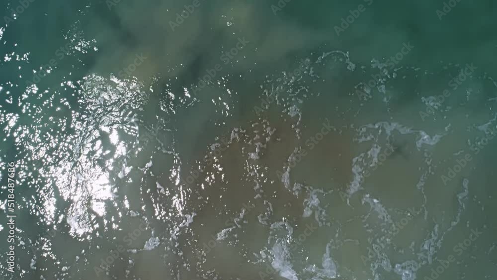 Beautiful texture of big waves power ocean waves with white waves break on beach sand at Phuket Thailand tropical beach Amazing waves background Top view Beautiful texture of big waves power ocean waves with white waves break on beach sand at Phuket Thailand tropical beach Amazing waves background Top view