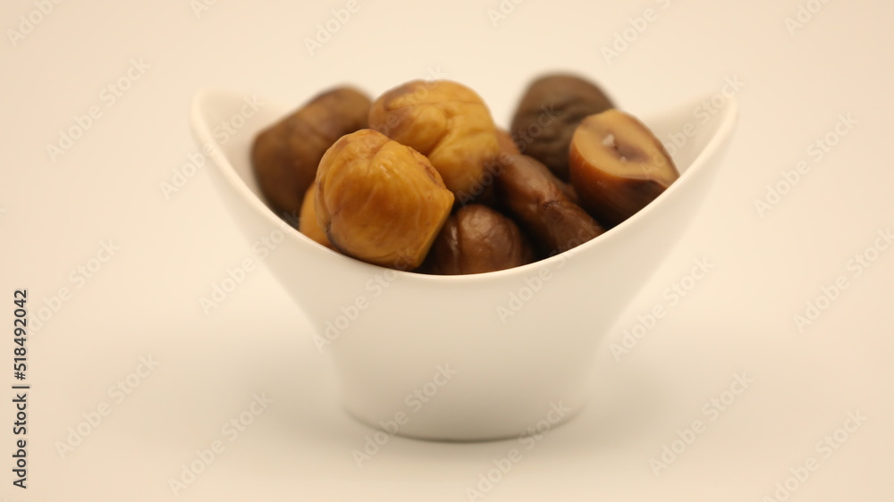 Fresh dates in bowl isolated Stock Photo Fresh dates in bowl isolated Stock Photo