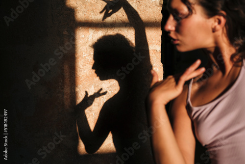 Woman and her silhouette photo