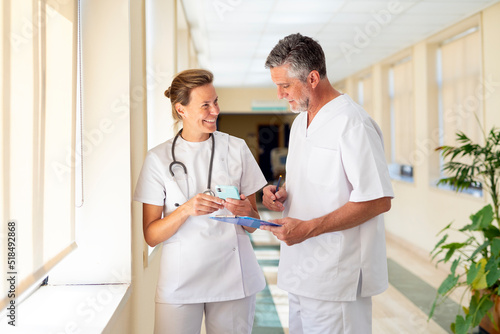 Nurse and doctor in a hall of an hospital