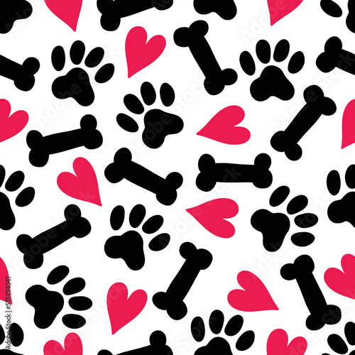 Paw prints, bones, hearts. Funny children's seamless pattern. Can be used in textile industry, paper, background, scrapbooking.Vector.