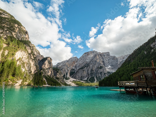The most famous crystal clear mountain lake at the Dolomites during summer with mountain scenery at the background © Wolfgang Hauke