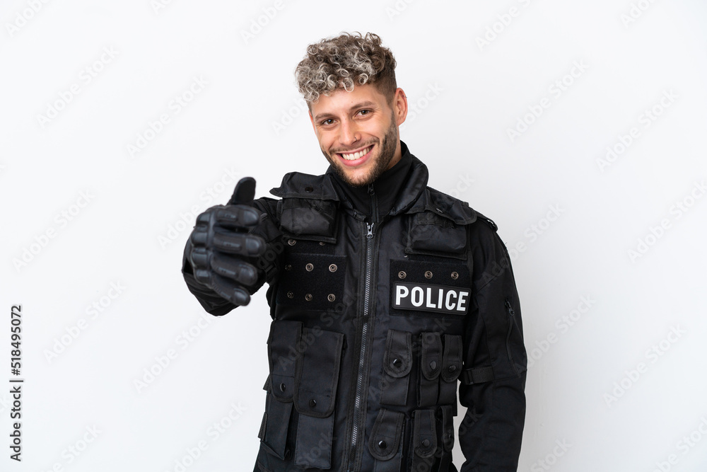 SWAT caucasian man isolated on white background shaking hands for closing a good deal