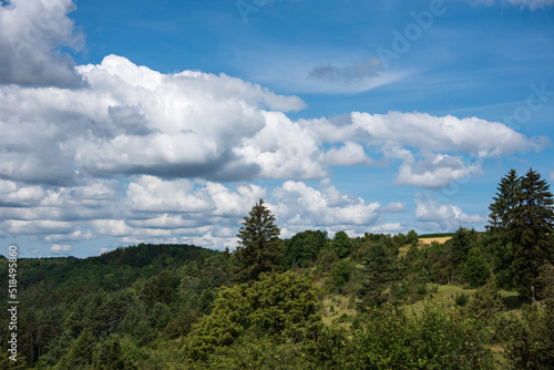 Obraz na płótnie a wooded valley in swabian alb with cloudy sky w salonie