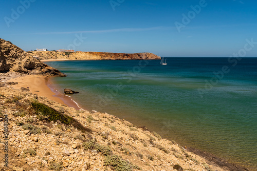 West Coast of Portugal. Atlantic Ocean, beach, cliffs and blue water. Sagres photo