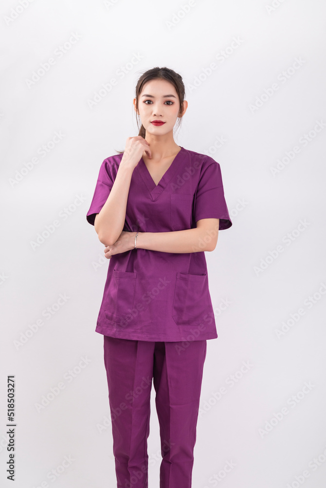 A female nurse in a purple uniform A female nurse in a purple uniform