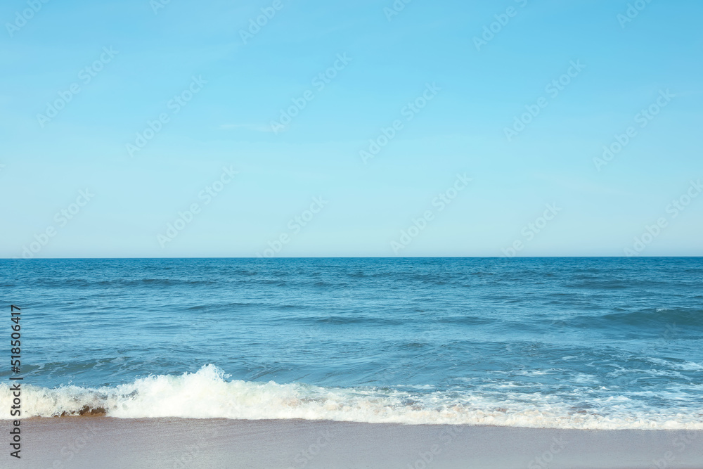 Picturesque view of beautiful sea and blue sky on sunny day
