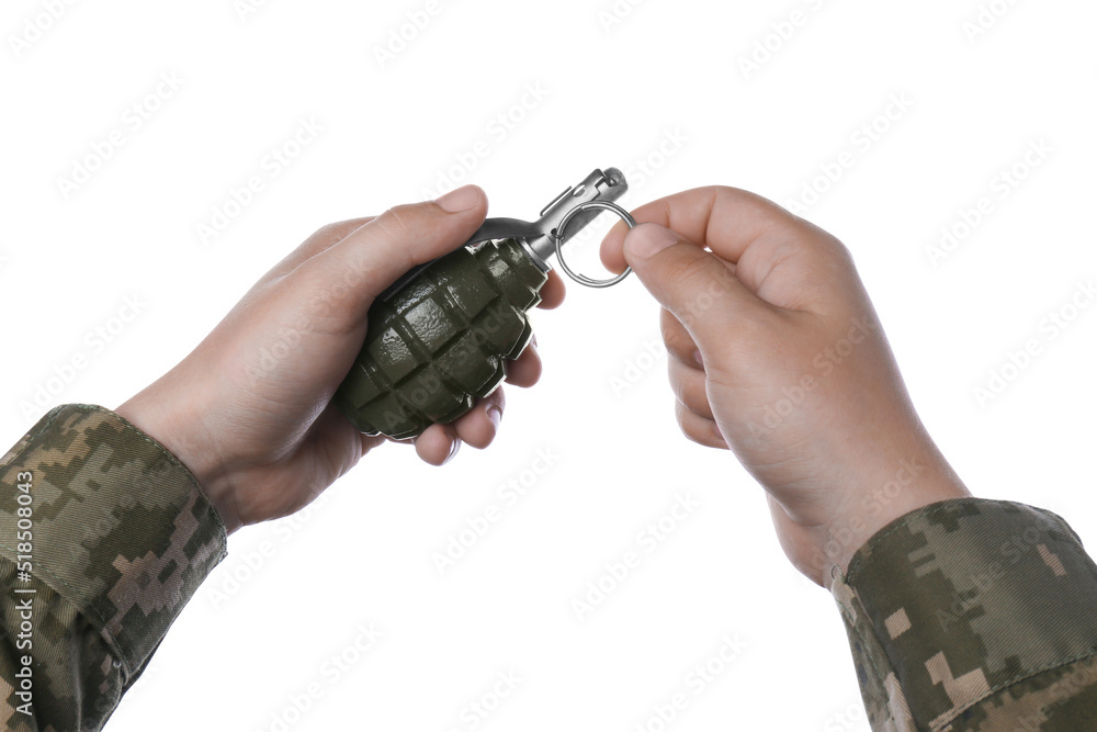Fototapeta premium Soldier pulling safety pin out of hand grenade on white background, closeup