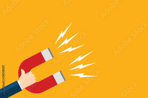 Hand of a businessman with magnet. Business concept of the attraction of money, customers and investment. Vector illustration