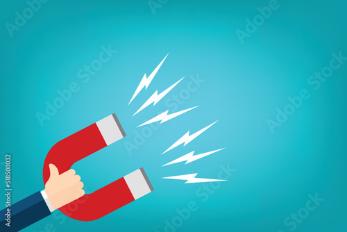 Hand of a businessman with magnet. Business concept of the attraction of money, customers and investment. Vector illustration