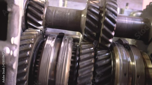 Gearbox with gears. Rotating gears in transmission. Car checkpoint.